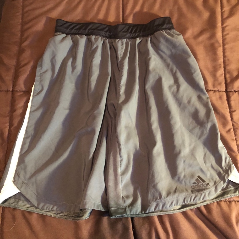 Adidas athletic shorts. Very cool style.